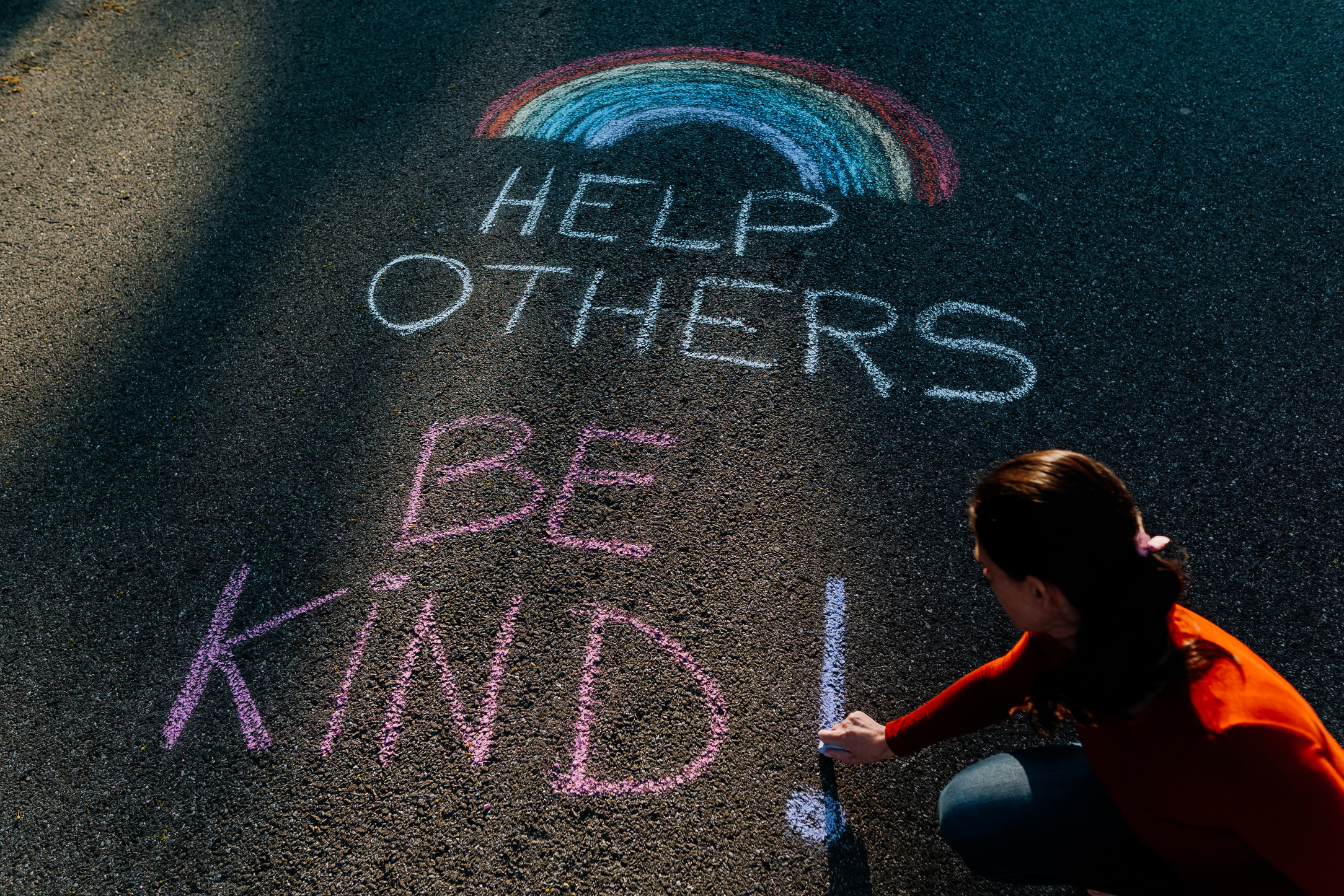 Help Others Message on the sidewalk during COVID-19